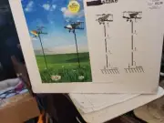 2611. NEW NANTUCKET PLANE WINDMILL WITH STAKE RED/YELLOW OR BLACK/WHITE