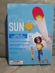 New - Bring On The Sun Light Up Foam Rocket with Launcher Base
