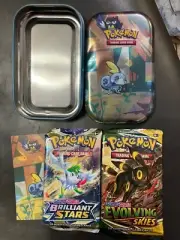 Pokémon Evolving Skies -OPEN tin With 1 Evolving Skies/1 Brilliant Stars Packs