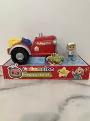 CoComelon Official Musical Toy Tractor w/ Sounds & 3-inch JJ Farm Figure