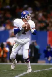 Quarterback John Elway Denver Broncos drops back to pass v C Football 1988 Photo