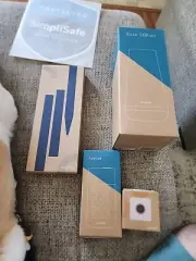 simplisafe security system..Base Station..Keypad ..Motion Sensor..And Sign