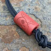 LynchNW S&W Red Cerakote “Jolly Roger” Titanium Lanyard Bead