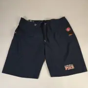 New Volcom NWT 4 Way Stretch Men’s Swim Board Shorts Size 36 blue Carlsbad Fire