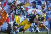 Running back Travis Jervey Green Bay Packers is wrapped up and - 1996 Old Photo