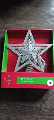 December Home Projector Tree Topper NEW silver in color