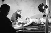 Sean Connery lies bare-chested on stretching machine during classi- Old Photo