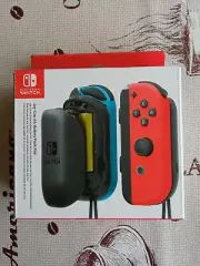 Joy-Con "travel" Charger with AA Batteries Nintendo Switch official accessory