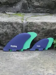4.9" / 3.1" RM quad set of fins, deep blue on green Pro Glass. FCSII compatible.