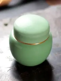 在飛比找樂天市場購物網優惠-龍泉茶葉罐陶瓷青瓷便攜小號金屬蓋陶瓷密封存茶罐家用茶罐存儲罐