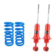 Front KYB SKORCHED 4'S Shock Absorbers Raised Coil Springs for NISSAN Navara D40