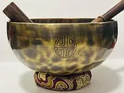 Traditional Tibetan Singing Bowl with Wooden Striker, Brass Construction, Decorative Buddhist Symbol, Purple Cushion