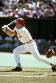 Outfielder Pete Rose Cincinnati Reds swings at a pitch and watche- 1974 Photo