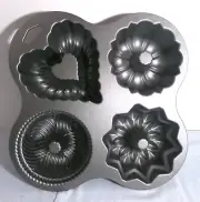 Nordic Ware QUARTET Bundt Pan 4 Mini Cake Shapes 9 Cups Heavy Cast Aluminum