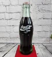6.5 oz COCA COLA COMMEMORATIVE BOTTLE - 1990 INTERNATIONAL CHRISTMAS - SPAIN