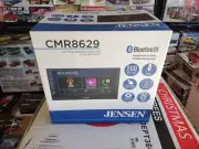 New Jensen brand radio w/ Bluetooth adn adapter for use In a Nissan Versa 2015