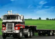 1/64 DCP INTERNATIONAL TRANSTAR COE W/ TRANSCRAFT STEPDECK TRAILER