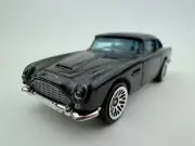 Hot Wheels 2016 Now and Then '63 Aston Martin DB5 Metalflake Black New Loose