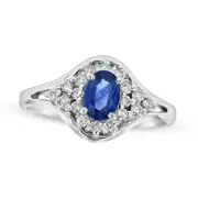 Oval Blue Sapphire and 0.25 CT. T.W. Natural Diamond Split Shank Ring in Solid 14K White Gold