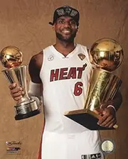 LeBron James with the NBA Championship & MVP Trophies Game 7 of the 2013 NBA Finals Sports Photo