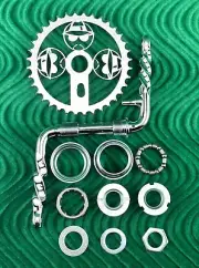 4 1/2" TWISTED 1 PIECE CHROME BICYCLE CRANK W/ TRIPLE LOWRIDER SPROCKET & B.B