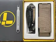 Leatherman MUT EOD Black multi tool with Brown/Tan Inserts. Discontinued Version