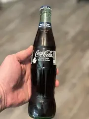 Bottle of Coca-Cola Coke Quebec Maple Flavored Soft Drink 355ml
