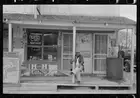 Photo:Mexican sitting on porch of store, Alamo, Texas