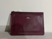 NEW COACH MEDIUM MERLOT SKINNY TECH ZIP POUCH CLUTCH BAG