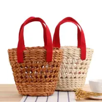 在飛比找ETMall東森購物網優惠-店長推薦手提純色小菜籃編織包