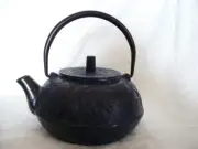 Teapot, cast iron with enamel inside and tea strainer Blue pattern Well-made.