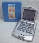 RAISING PRESS UP DIGITAL CALENDAR/CALCULATOR W/ ALARM CLOCK AND WORLD TIME