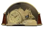 Elegant Quartz Rotating Pendulum Futuristic City Table Clock ~Gold Tone 13”Lx8”H