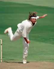 Paul Smith bowling for Warwickshire during their Benson and H- Old Cricket Photo