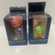 Vintage 1978 TOMY Kid-A-Long WIND-UP BABY Lot of 2, Skateboard, Roller skates.