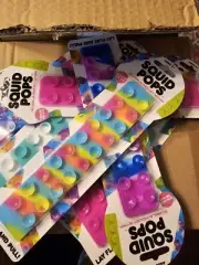 NEW Squid Pops Fidget Stress Straps 48 Packs Purple/Blue/Pink/Yellow Swirl