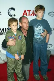 Miguel Ferrer his children Raphael Lukas arrive video game launch- 2003 Photo