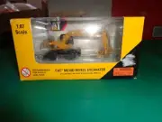 Norscot Cat M3180 Wheel Excavator 1:87 Scale Die Cast Model New in Box