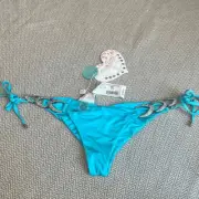Beach Bunny Swimwear Bow and Arrow Aqua Skimpy Bottoms New With Tags Size Medium