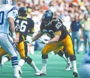 Offensive lineman Pete Rostosky Pittsburgh Steelers blocks against- Old Photo