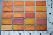 1125.31 - 20 PIECES IRIDIZED TRANSPARENT ORANGE 1/2"x 1" BULLSEYE GLASS 90 COE