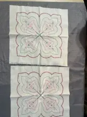 Two large hand embroidered quilt blocks