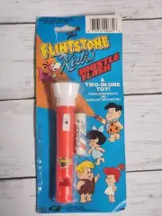 The Flintstone Kids Whistle Flash a two in one toy! Whistle Flashlight