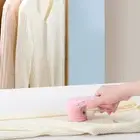 Quick and Efficient Electric Lint Remover for Furniture and For Bedding