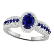 Oval Blue Sapphire and 0.20 CT. T.W. Natural Diamond Frame Ring in Solid 10K White Gold