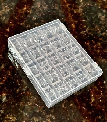 25 Bobbins in storage case for Viking Emerald 116-203, Star, C-10 EM-10 H-Class