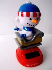 Solar Powered Snowman Bobble Head / On Rocking Snow Sled Holding a Snowball # 1