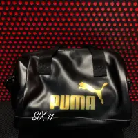 在飛比找蝦皮購物優惠-@SIX@PUMA 旅行包 黑金 小圓筒 多功能 手提包 側