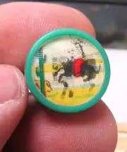 plastic 1960s dime store vending machine toy Flicker Ring Cowboy on bronco green