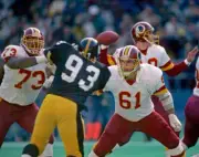 Offensive linemen Ken Huff and Mark May Washington Redskins block - Old Photo